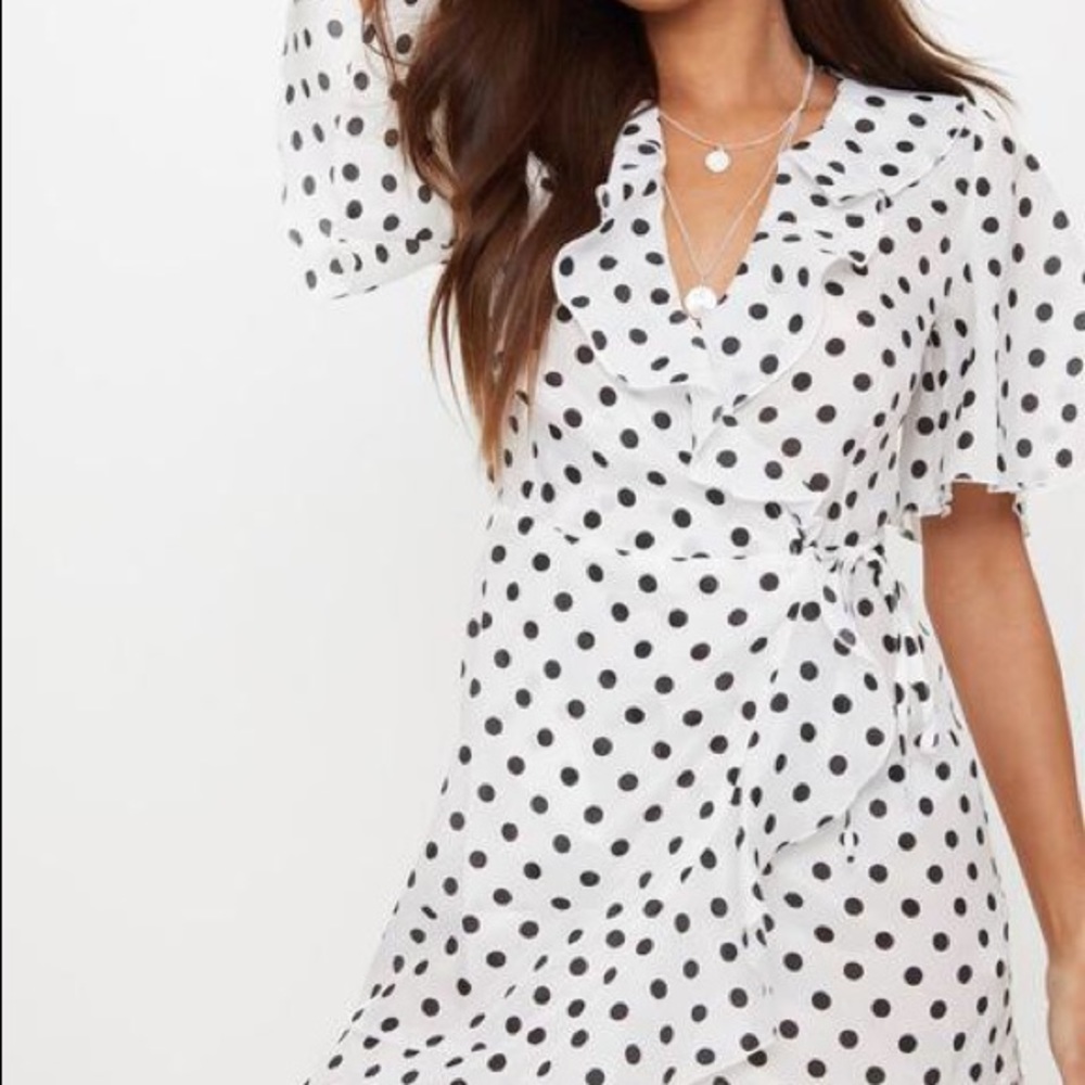 Pretty little thing polka dot sundress. Size 6